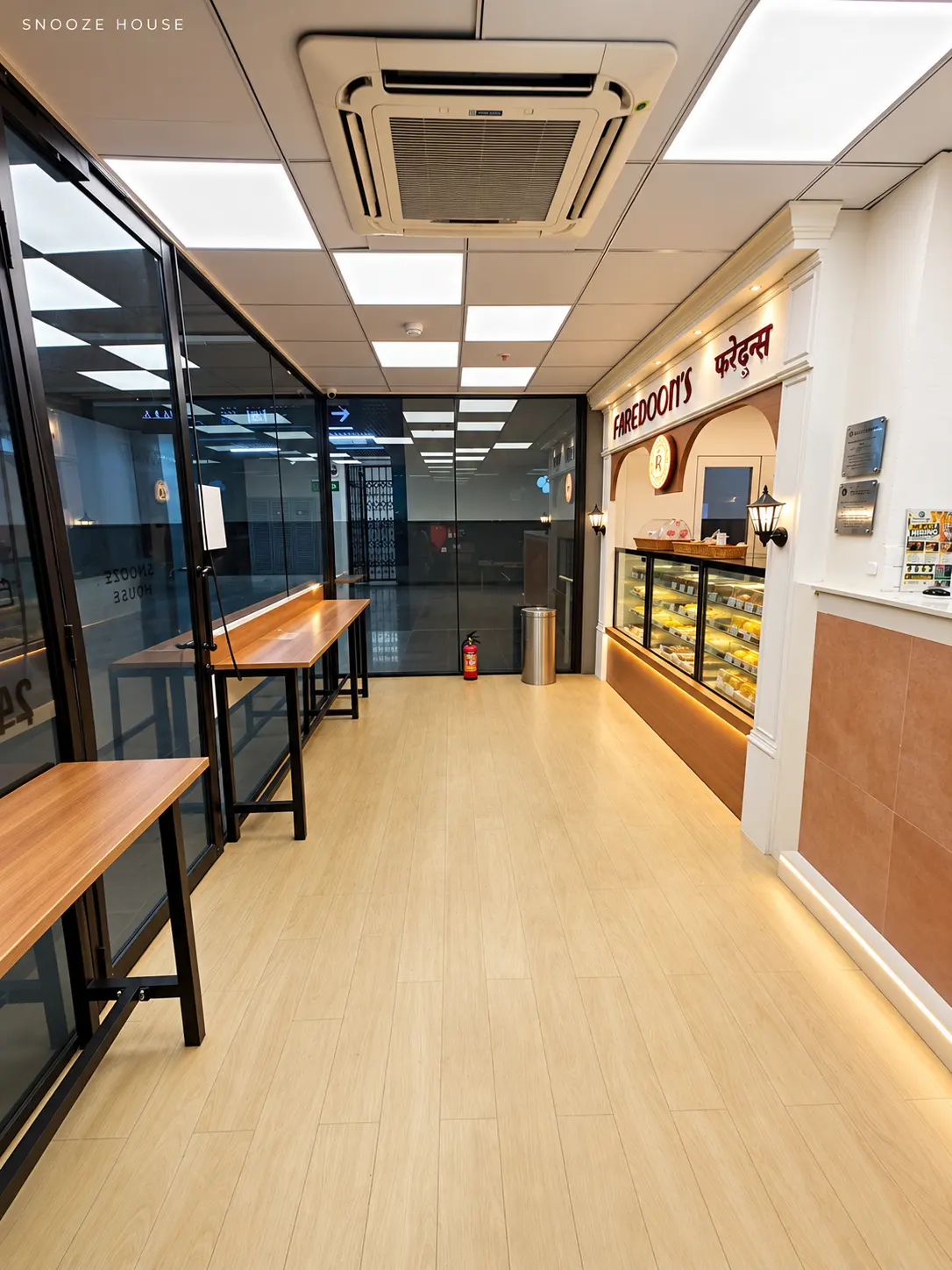 Faredoon's bakery counter beside the work tables in the lobby